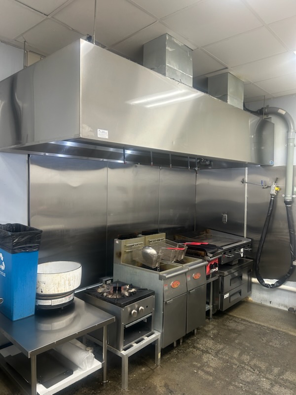 Full commercial kitchen exhaust system after professional cleaning
